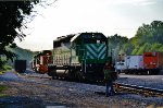 The conductor lets 6987 out of the siding.